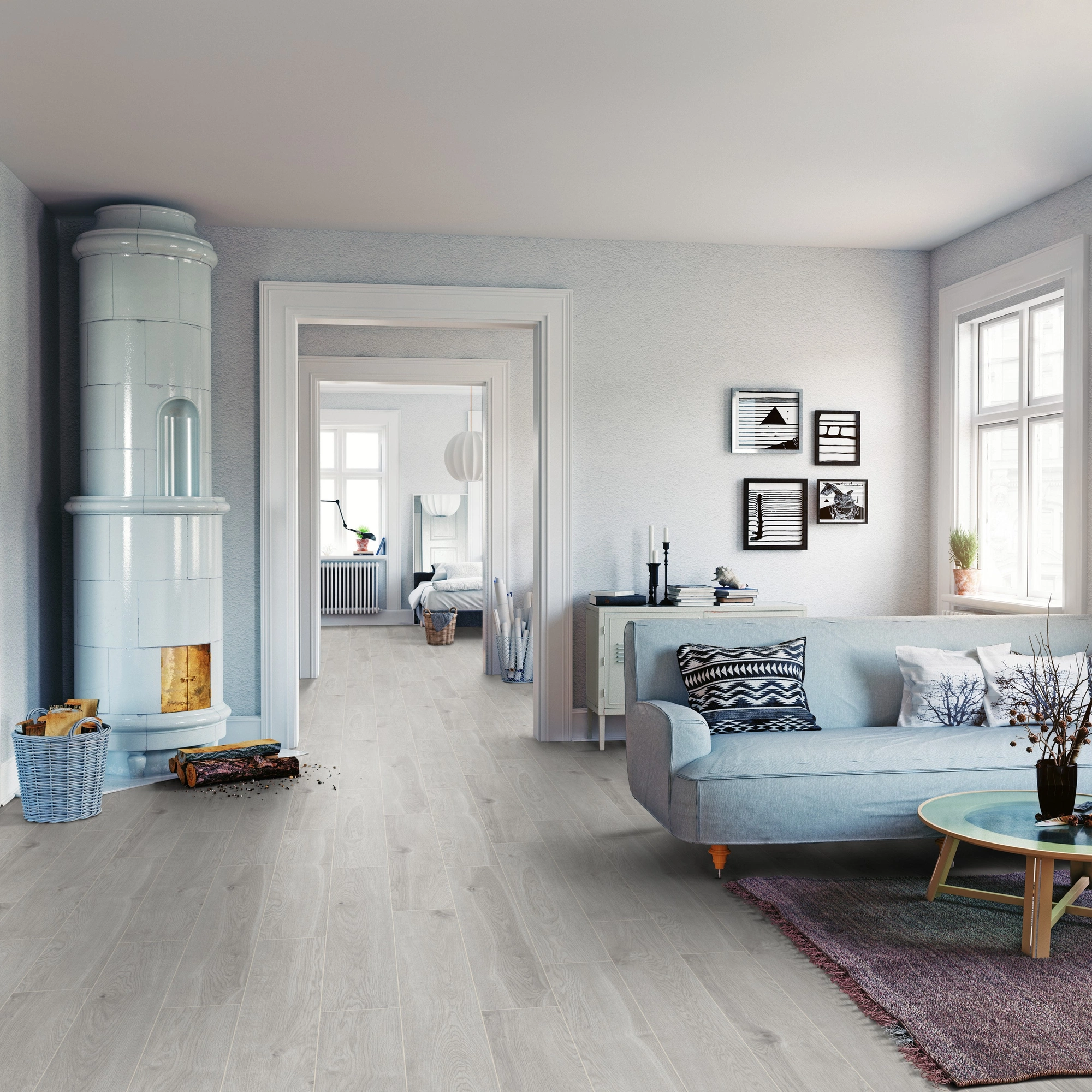 Milieubild Wohnzimmer mit Sofa und Kachelofen - ter Hürne Klick-Designboden Dureco Strong Classic Edition Eiche Gotland Milieubild Wohnzimmer mit Sofa und Kachelofen - ter Hürne 1101260051