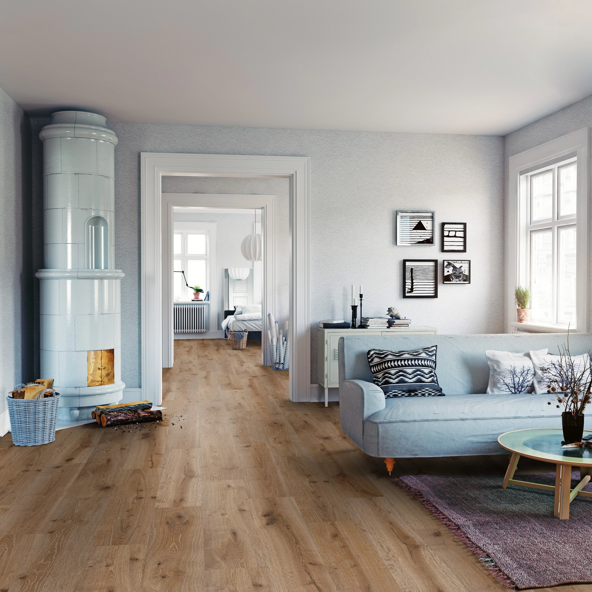 Milieubild Wohnzimmer mit Sofa und Kachelofen - ter Hürne Klebe-Designboden Avatara Pro Classic Edition Eiche Lyra Milieubild Wohnzimmer mit Sofa und Kachelofen - ter Hürne 1101270104