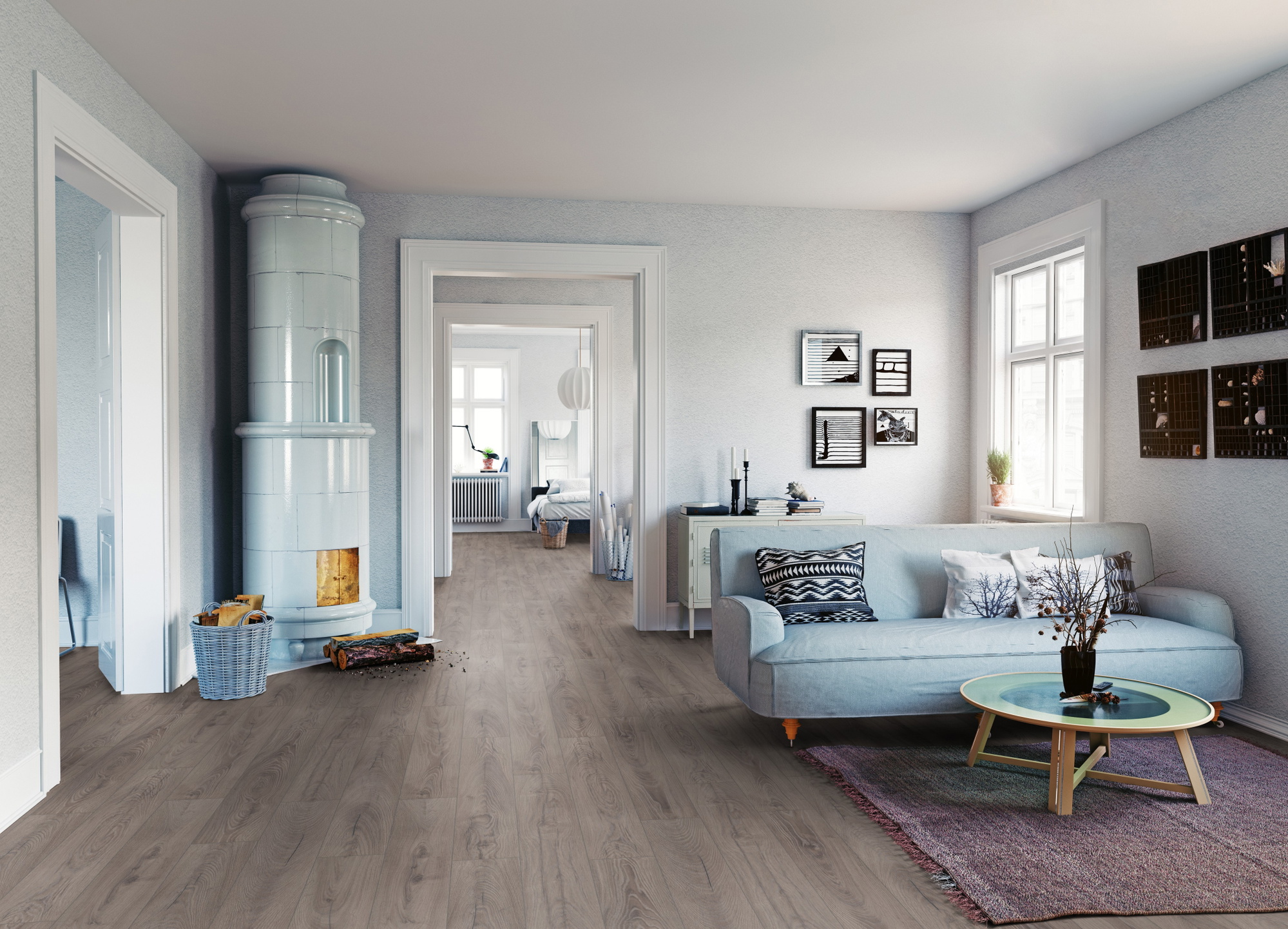 Milieubild Wohnzimmer mit Sofa und Kachelofen - ter Hürne HDF Klick-Designboden Dureco Silent Classic Edition Eiche Negros Milieubild Wohnzimmer mit Sofa und Kachelofen - ter Hürne 1101330006