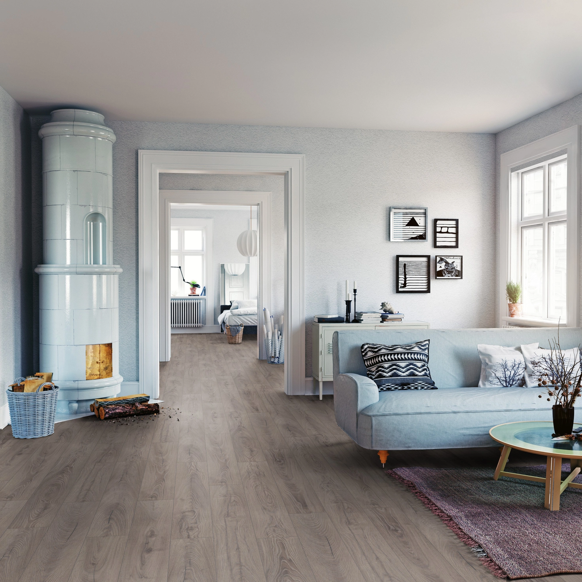 Milieubild Wohnzimmer mit Sofa und Kachelofen - ter Hürne HDF Klick-Designboden Dureco Silent Classic Edition Eiche Negros Milieubild Wohnzimmer mit Sofa und Kachelofen - ter Hürne 1101330006