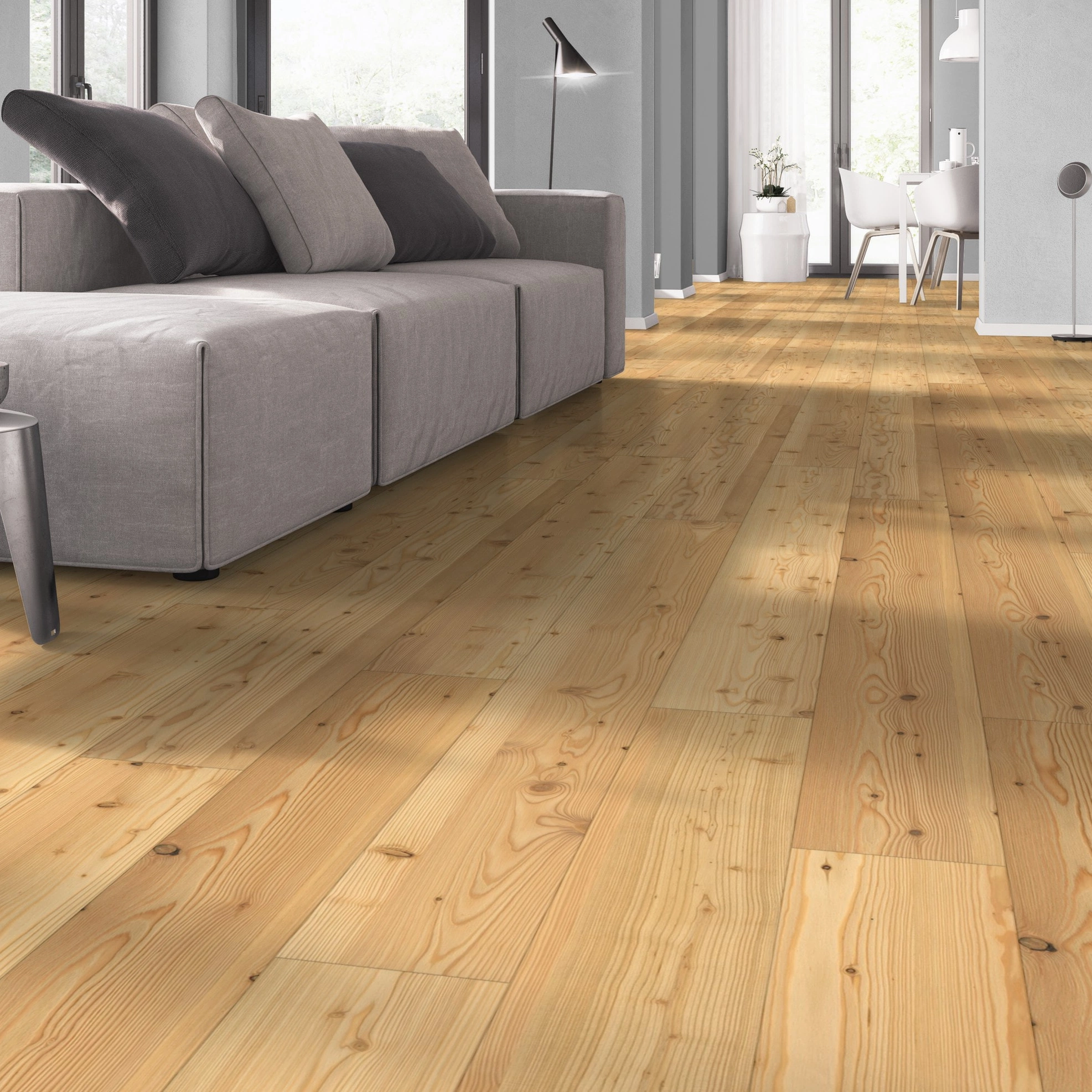 Milieubild Wohnzimmer mit Sofa - bodentiefe Perspektive - Admonter Parkett Stammbaum Kollektion Lärche natur Milieubild Wohnzimmer mit Sofa - bodentiefe Perspektive - Admonter 118345