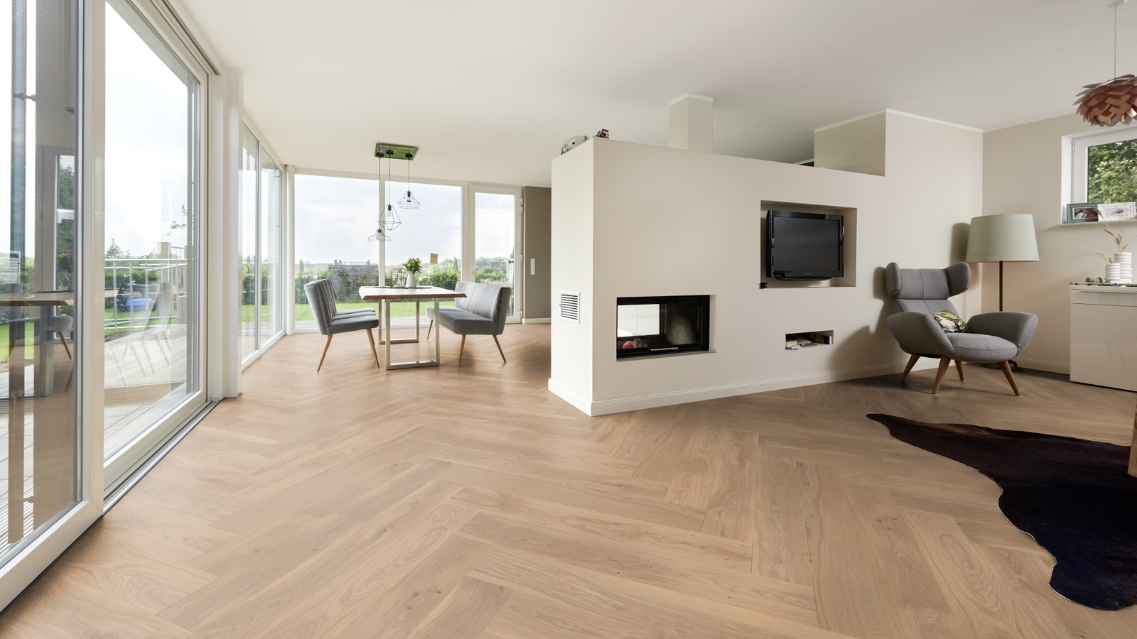 Milieubild Wohnzimmer mit Essbereich und Kamin - ter Hürne 1101312520