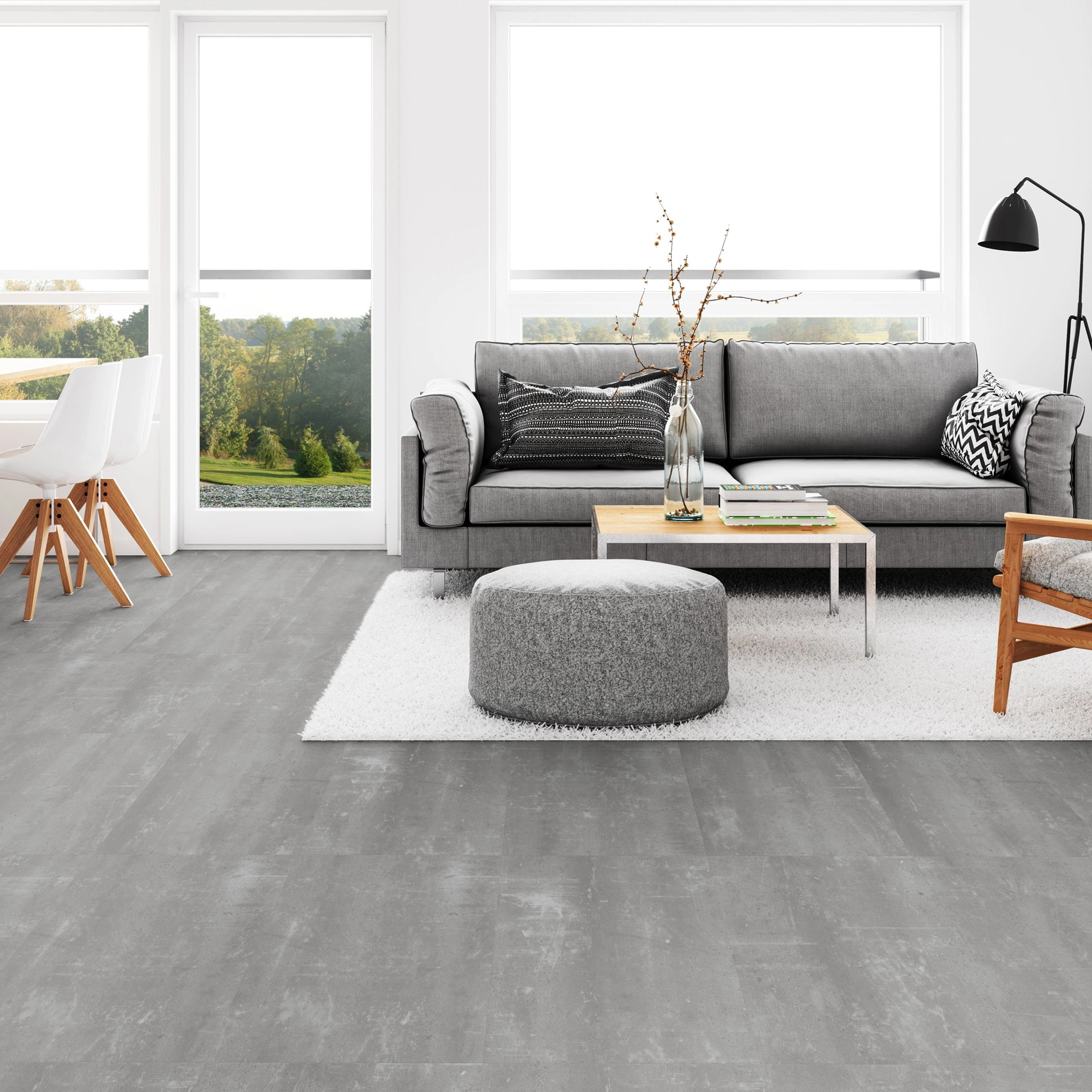Milieubild Wohnzimmer mit Esszimmer - Tarkett Klebe-Vinyl Essence 55 Scratched Cement Grey Milieubild Wohnzimmer mit Esszimmer - Tarkett 260054010