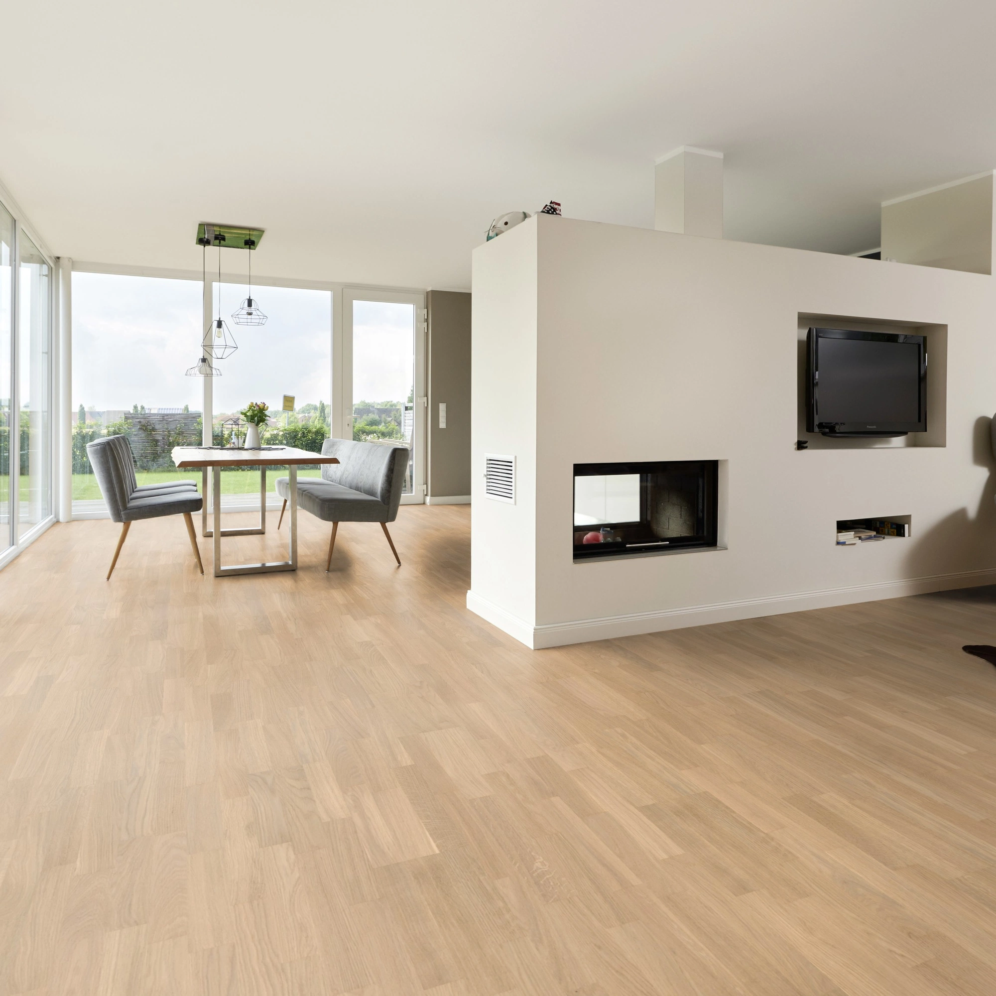 Milieubild Wohnzimmer mit Essbereich und Kamin - ter Hürne Parkett Tailored Collection Eiche Piemont Milieubild Wohnzimmer mit Essbereich und Kamin - ter Hürne 1101312488