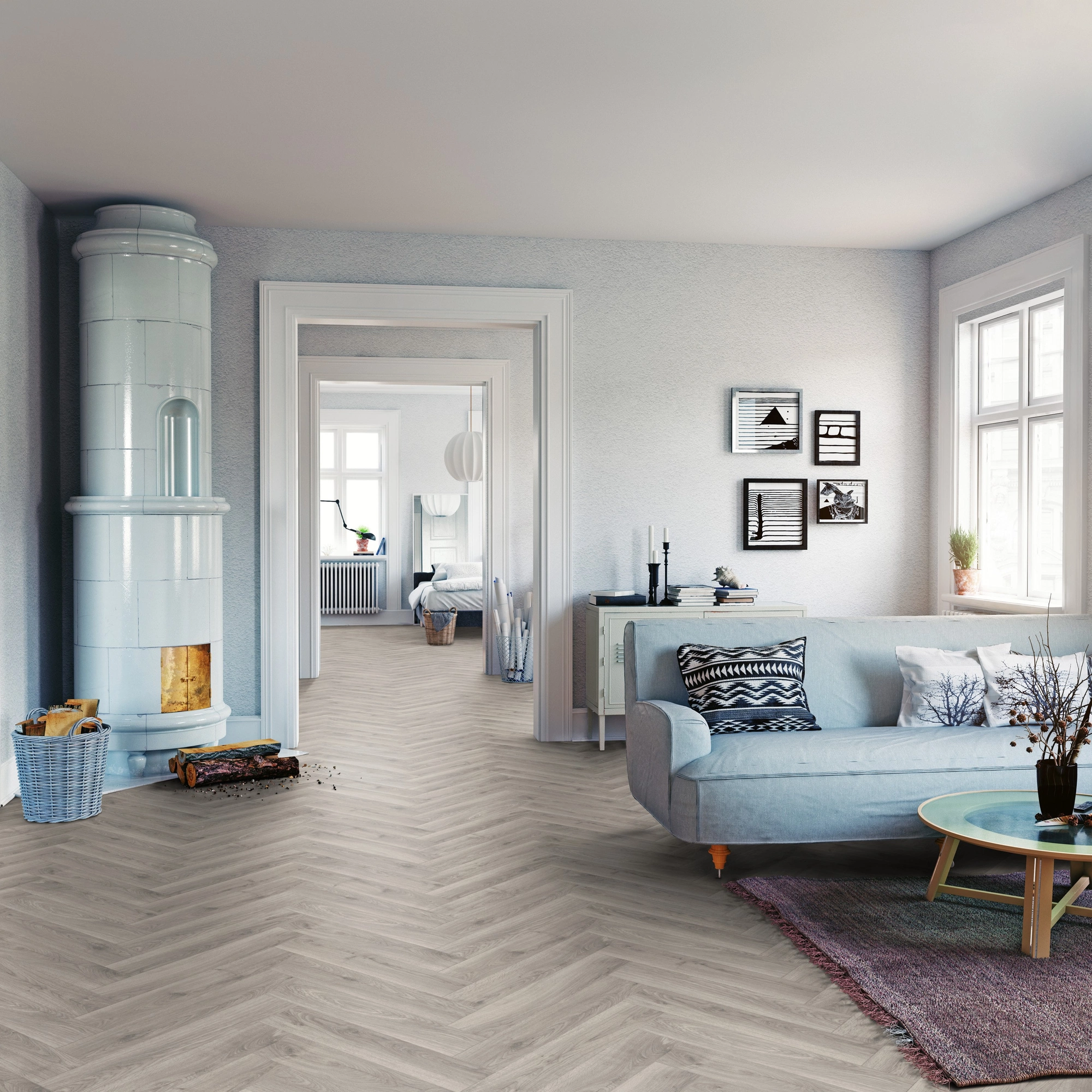 Milieubild Wohnzimmer mit Sofa und Kachelofen - ter Hürne Laminat Herringbone Edition Eiche Atelier Milieubild Wohnzimmer mit Sofa und Kachelofen - ter Hürne 1101021850